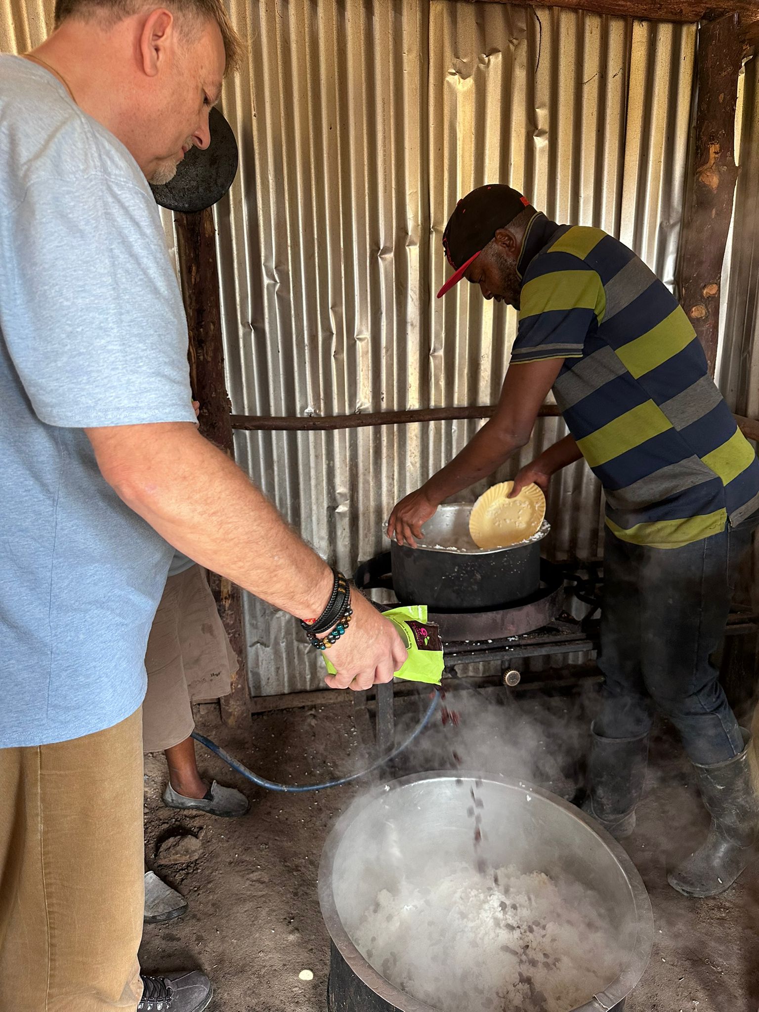 An image of Iain Andre cooking in the orphanage